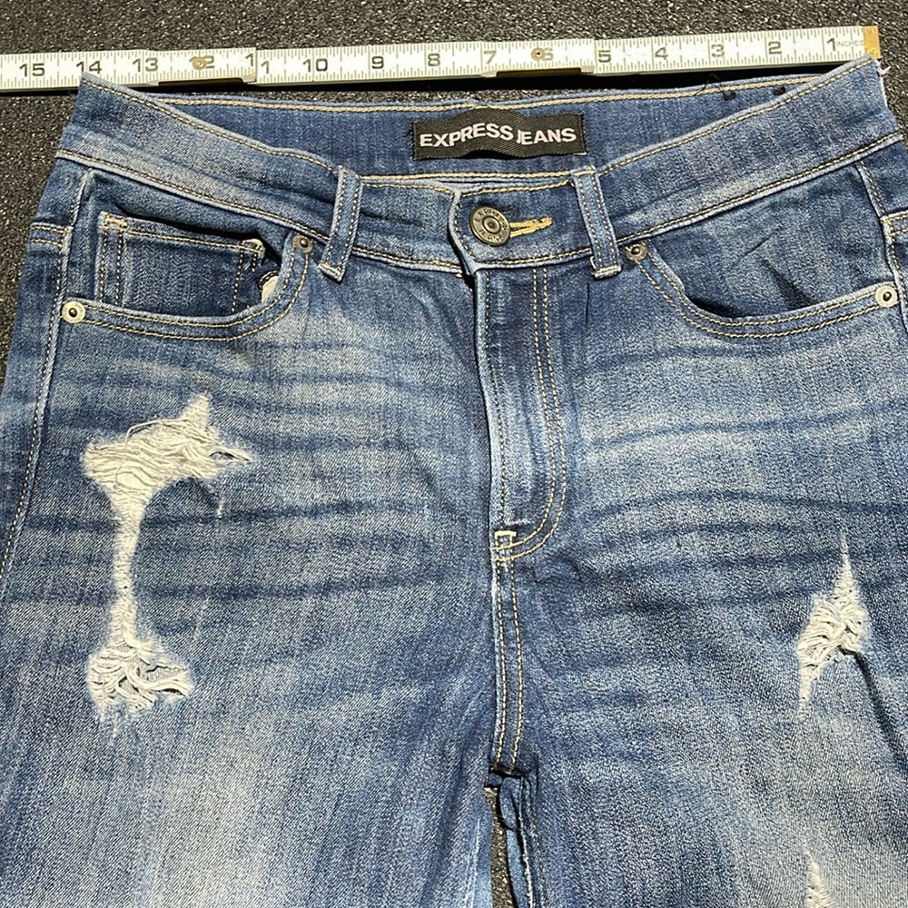 Express high rise leggings distressed medium blue color size 4 Long women’s.